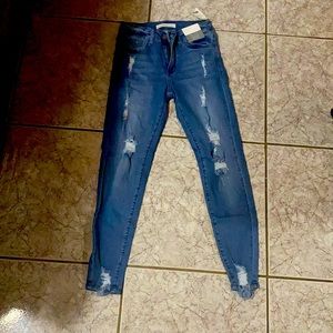 NEW NEVER WORN ripped skinny jeans